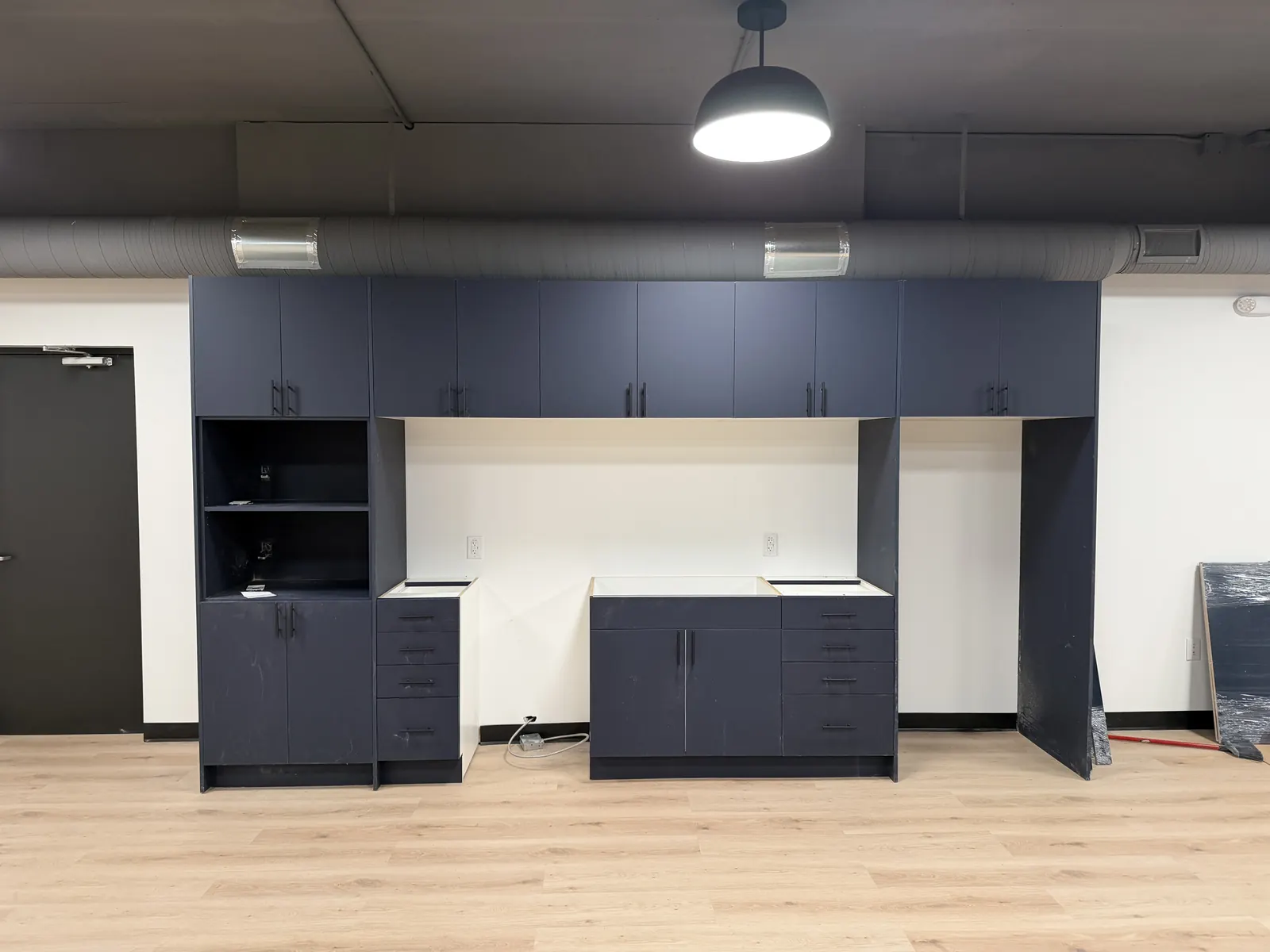 Built-in cabinetry in an open-plan workspace